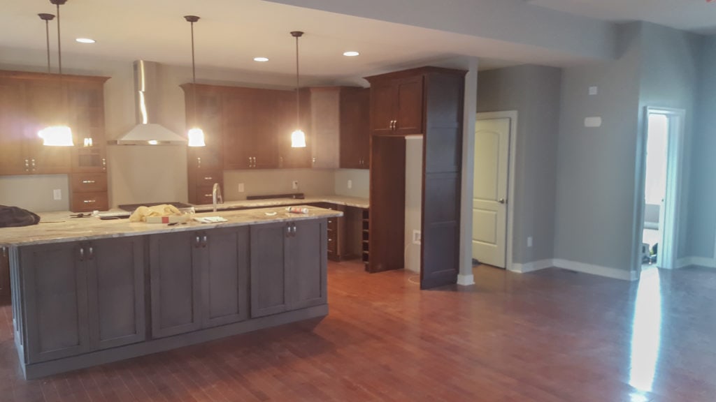 Kitchen design with cabinets by Custom Quality Renovations.